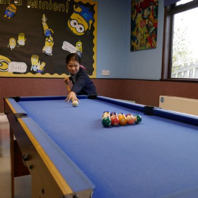 Another pupil playing pool