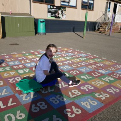 One pupil sitting in the one hundred square