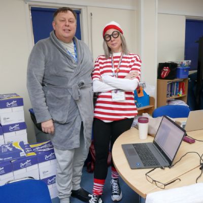 Staff members dressed as various book characters for WBD